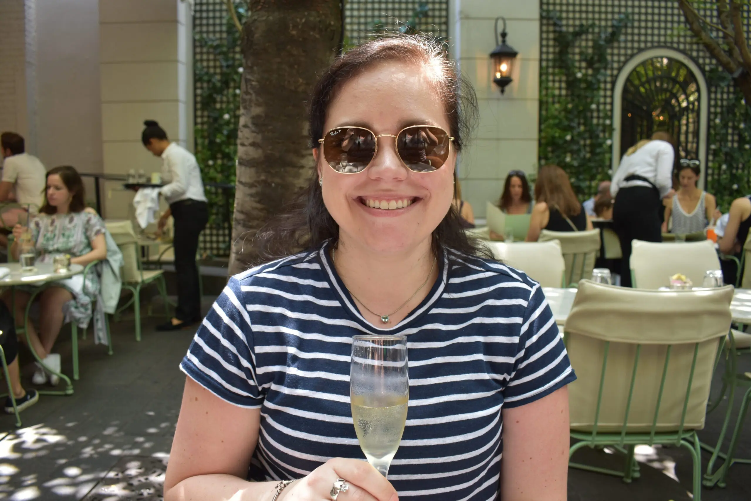Frame Classic Linen Stripe Crew - Cats & Coffee Christine Csencsitz sipping champagne at Lauduree Soho in summer 2018.