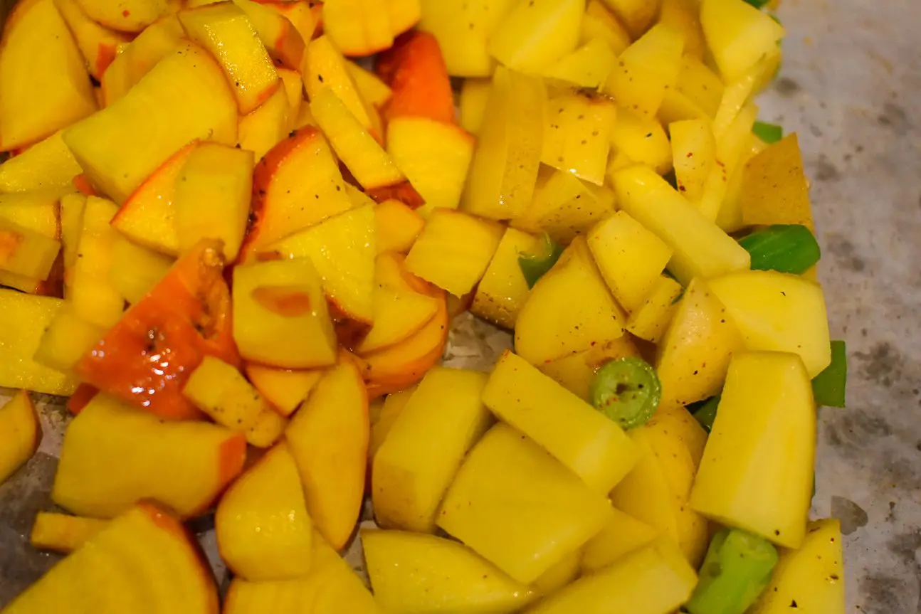 Roasted vegetables 4 - Cats & Coffee Diced golden beets and potato with scallion.