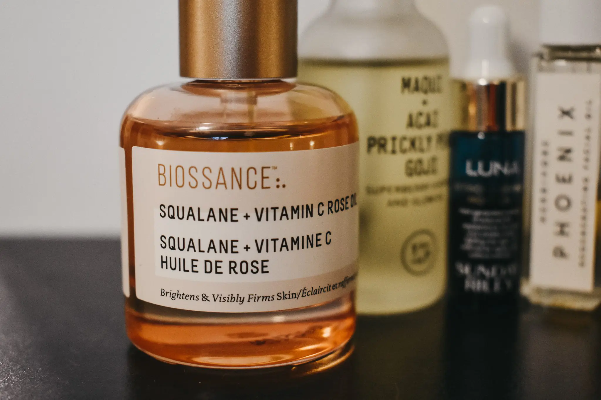 Facial OilsDSC_0015 - Cats & Coffee Facial Oils -- featuring Youth to the People Maqui + Acai Prickly Pear Goji Superberry Hydrate and Glow Oil, Sunday Riley's Luna retinol night oil, Biossance's Squalane + Vitamin C rose oil, and Herbivore products (Pheonix regenerating facial oil and prism natural fruit acid glow potion)