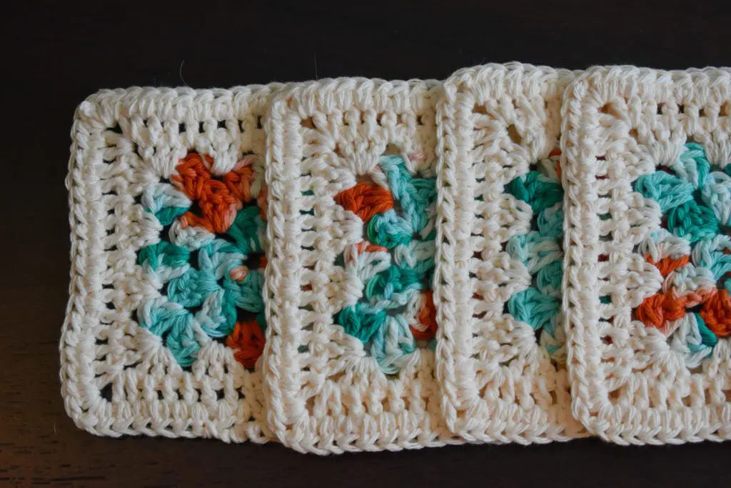 Cream-Edge-Blue-and-Coral-Coasters27-1 - Cats & Coffee Teal, Coral, and Cream Four Piece Granny Square Crochet Coaster Set -- Made With Colorful Cotton Yarn -- Critter Crafting by Christine Csencsitz