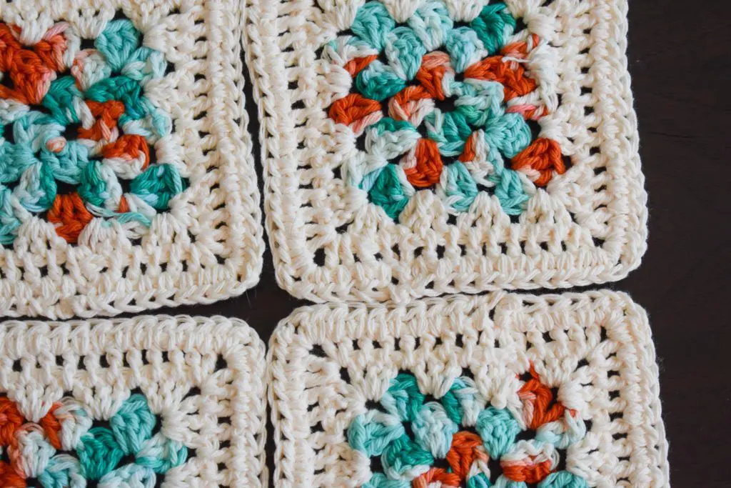 Cream-Edge-Blue-and-Coral-Coasters5 - Cats & Coffee Teal, Coral, and Cream Four Piece Granny Square Crochet Coaster Set -- Made With Colorful Cotton Yarn -- Critter Crafting by Christine Csencsitz