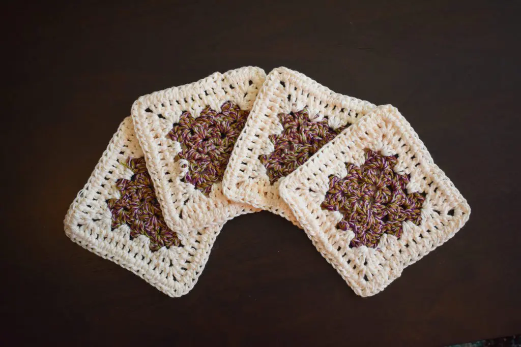 Purple-and-Cream-Coasters19 - Cats & Coffee Rich Purple and Cream Four Piece Granny Square Crochet Coaster Set - Made With Colorful Cotton Yarn in Purple, Pink, Burnt Orange, and Green from Critter Crafting by Christine Csencsitz