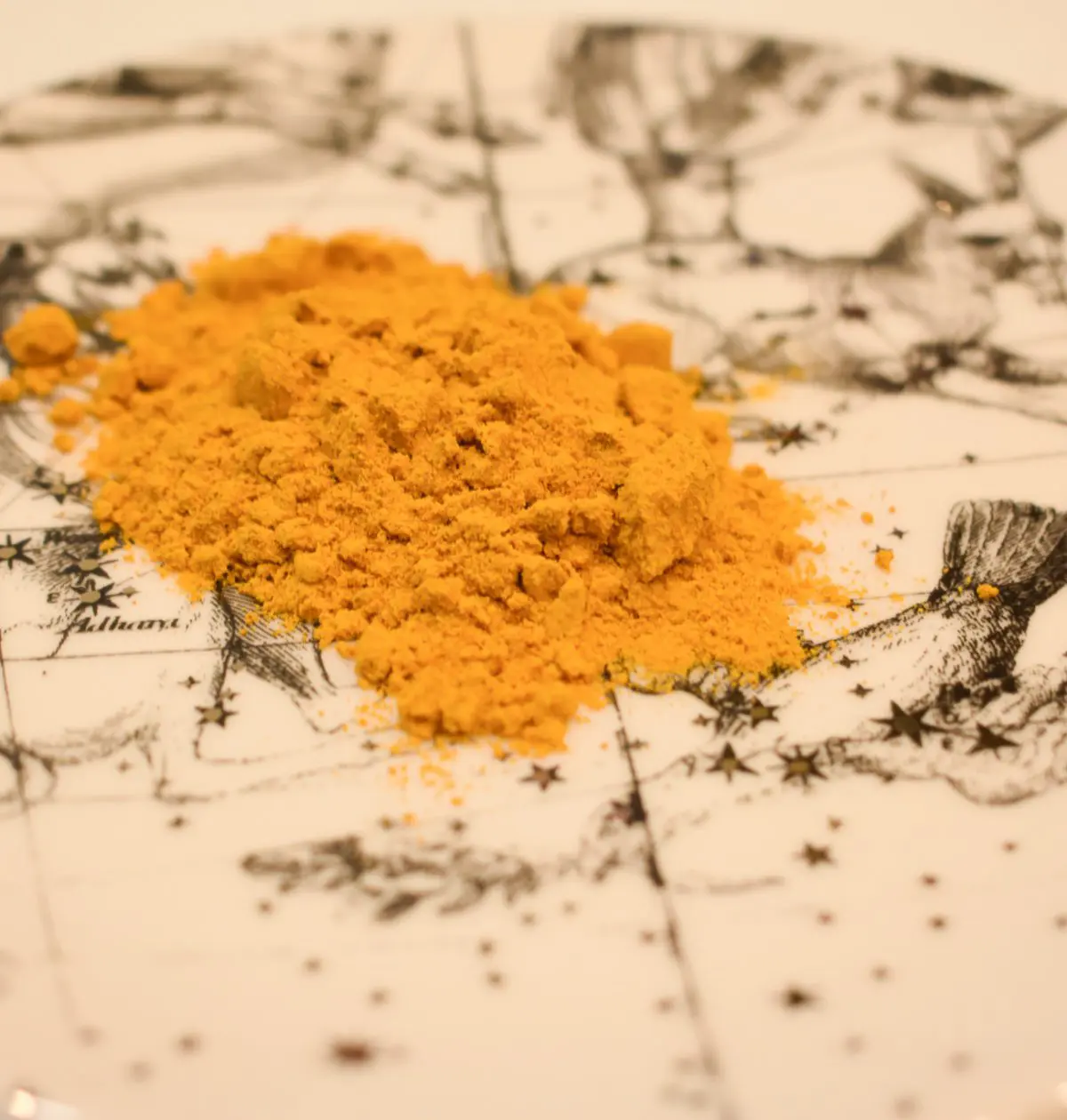 Ground turmeric on Anthropologie plates, photo by Christine Csencsitz