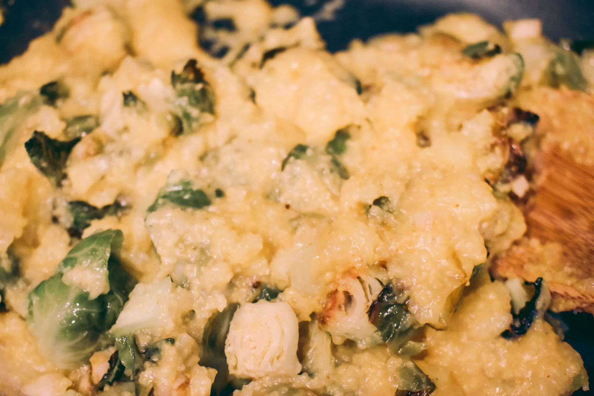 Polenta-with-Roasted-Brussels-Sprouts22 - Cats & Coffee Creamy polenta topped with roasted Brussels sprouts and herbs — a cozy vegetarian Thanksgiving recipe idea.