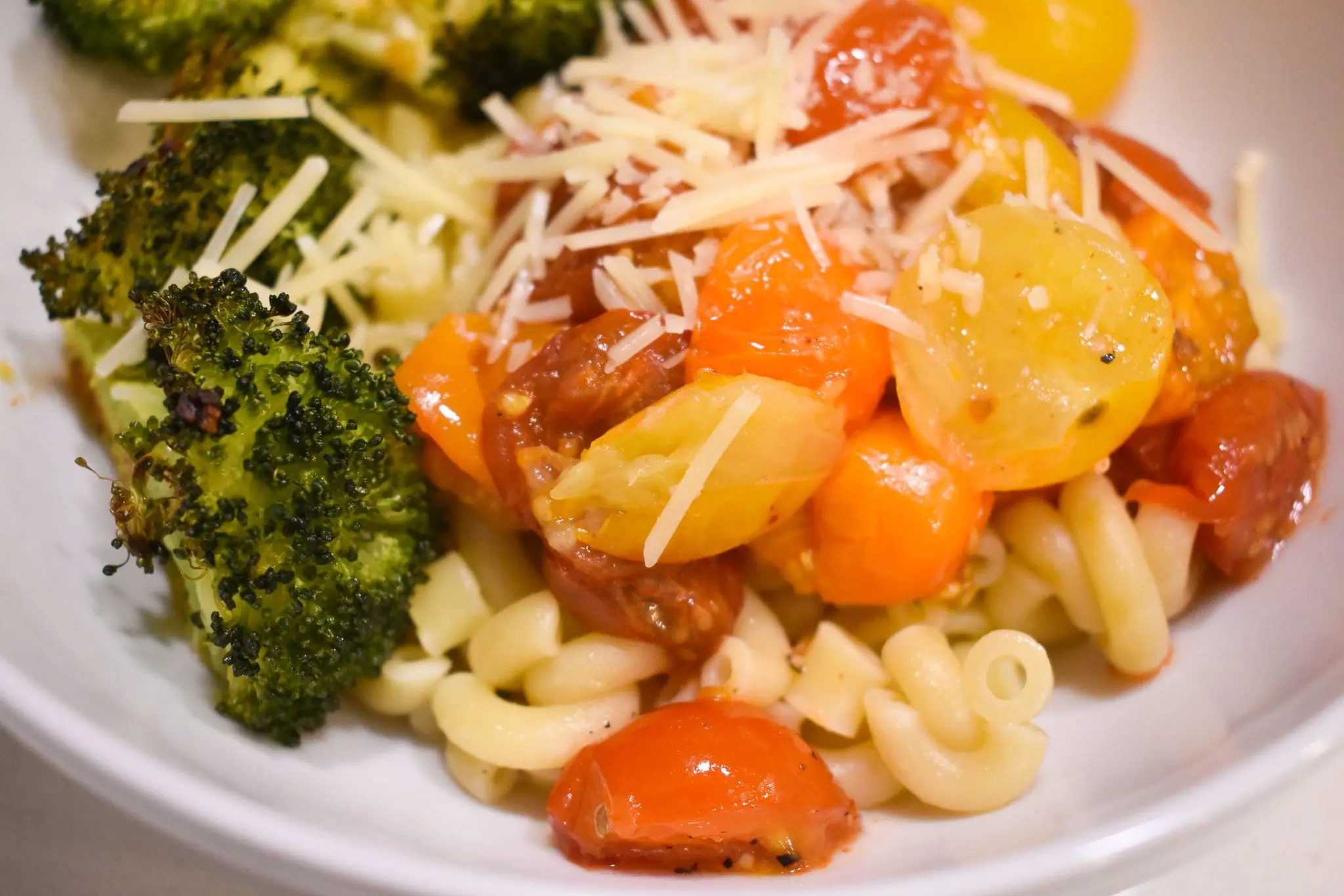 Simple-Roasted-Pomodoro-Pasta35 - Cats & Coffee Roasted pomodoro pasta is a great plant-based, crowd-pleasing dinner option. It combines two of my favorite foods: pasta and roasted vegetables! Not only is it bright and colorful, it’s also nutritious and quick. Customize this recipe to your taste, or follow the steps exactly, and you’ll have a great meal in no time. Get the full thirty-minute recipe for roasted pomodoro pasta here!