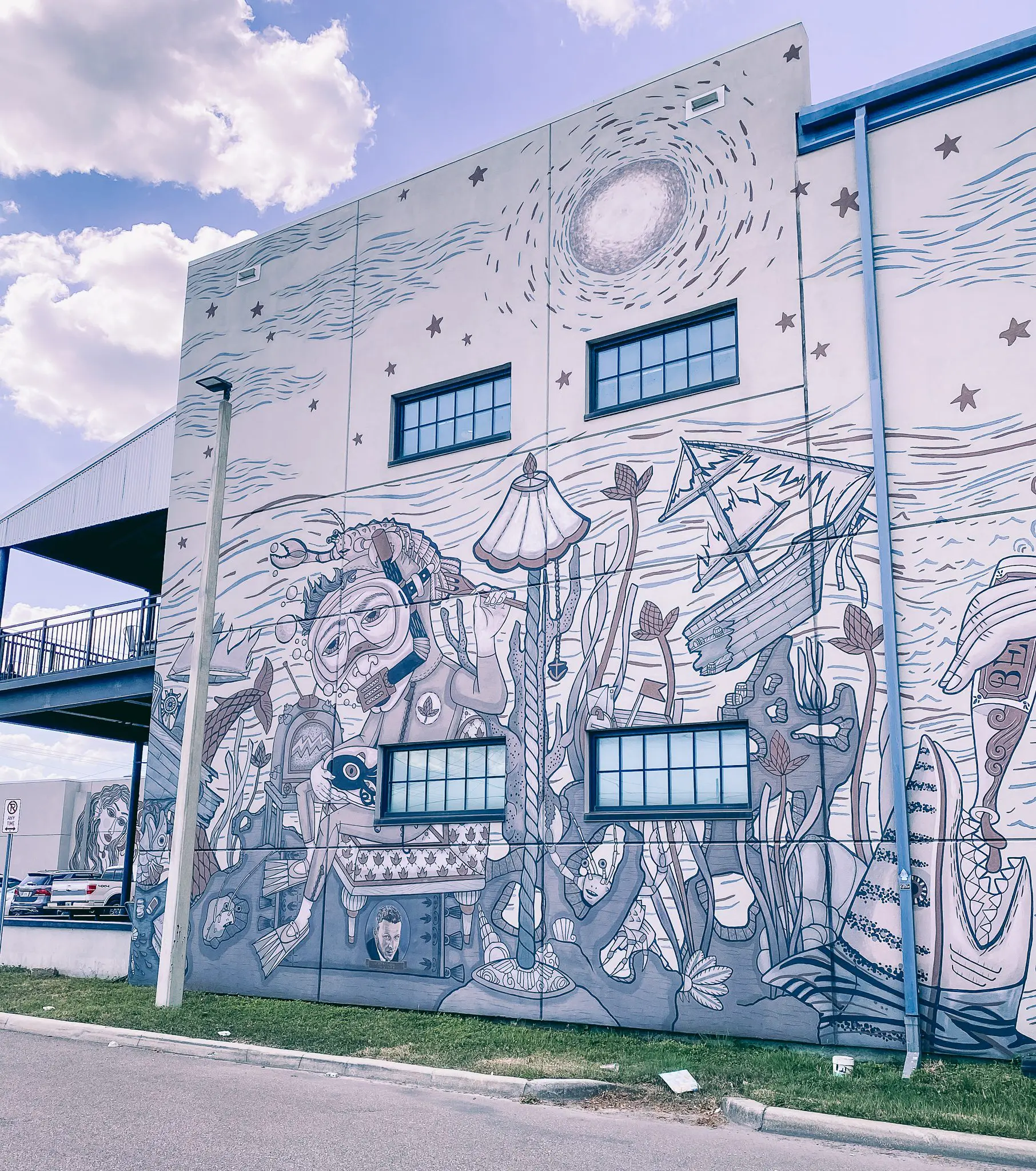 The-Best-Breweries-in-Tampa-for-Craft-Beer-Lovers-Cats-Coffee-by-Christine-Csencsitz-Coppertail-Brewing7 - Cats & Coffee Mural walls at Coppertail Brewing in Tampa
