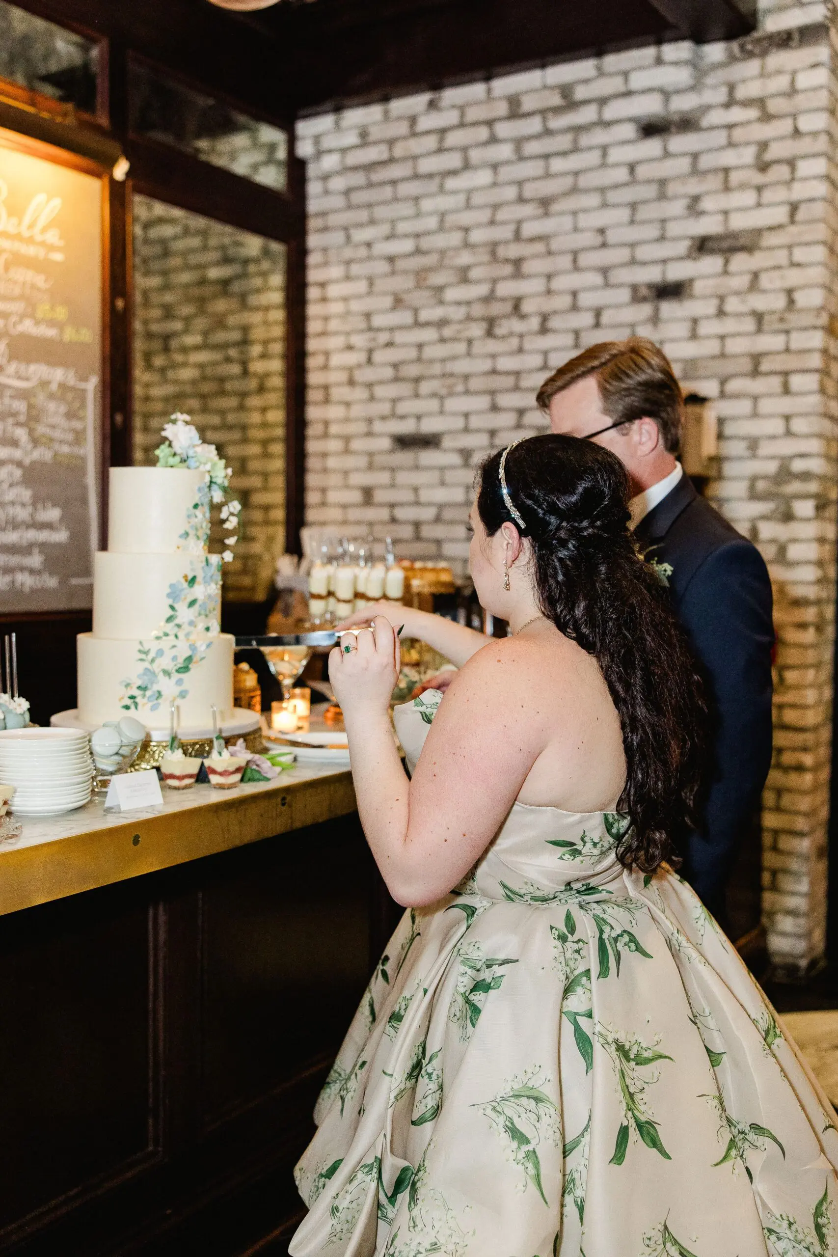 OxfordExchangeWedding©AilynLaTorrePhotograpy-3486-min - Cats & Coffee Oxford Exchange Wedding in Tampa, Florida - Featuring Monique Lhuillier Lily of the Valley wedding gown, The Black Tux suit, and local Hands on Sweets cake makers