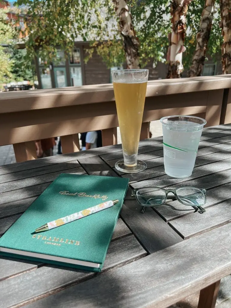Beer on the Balcony of Spruce Peak Lodge - Cats & Coffee