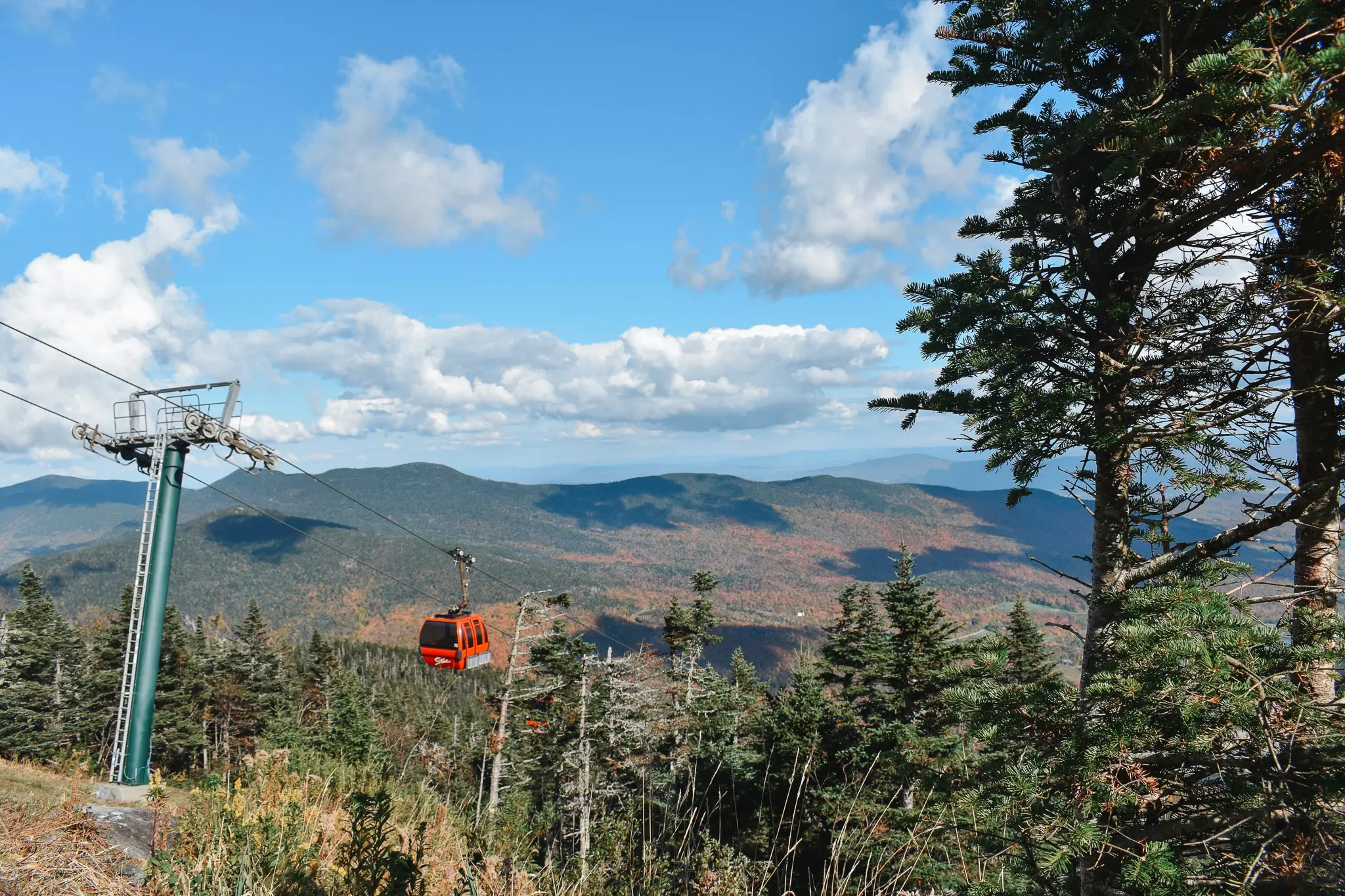 Stowe Vermont A Fall Photo Journal of Our Mini Honeymoon Getaway 20 - Cats & Coffee Gondola arriving at the summit of Mount Mansfield, showcasing panoramic views of Vermont’s highest peak