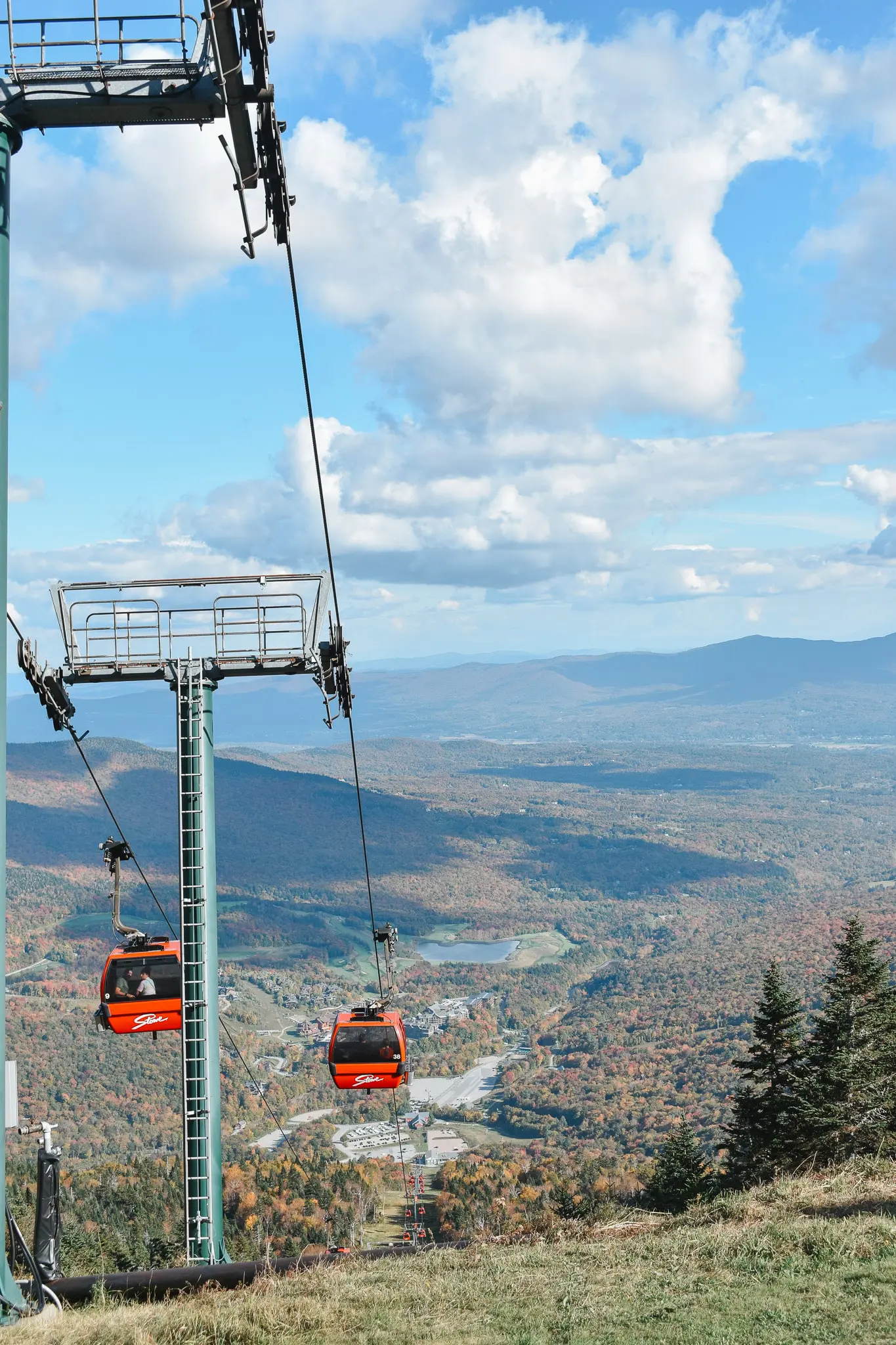 Stowe Vermont A Fall Photo Journal of Our Mini Honeymoon Getaway 30 - Cats & Coffee Gondola arriving at the summit of Mount Mansfield, showcasing panoramic views of Vermont’s highest peak