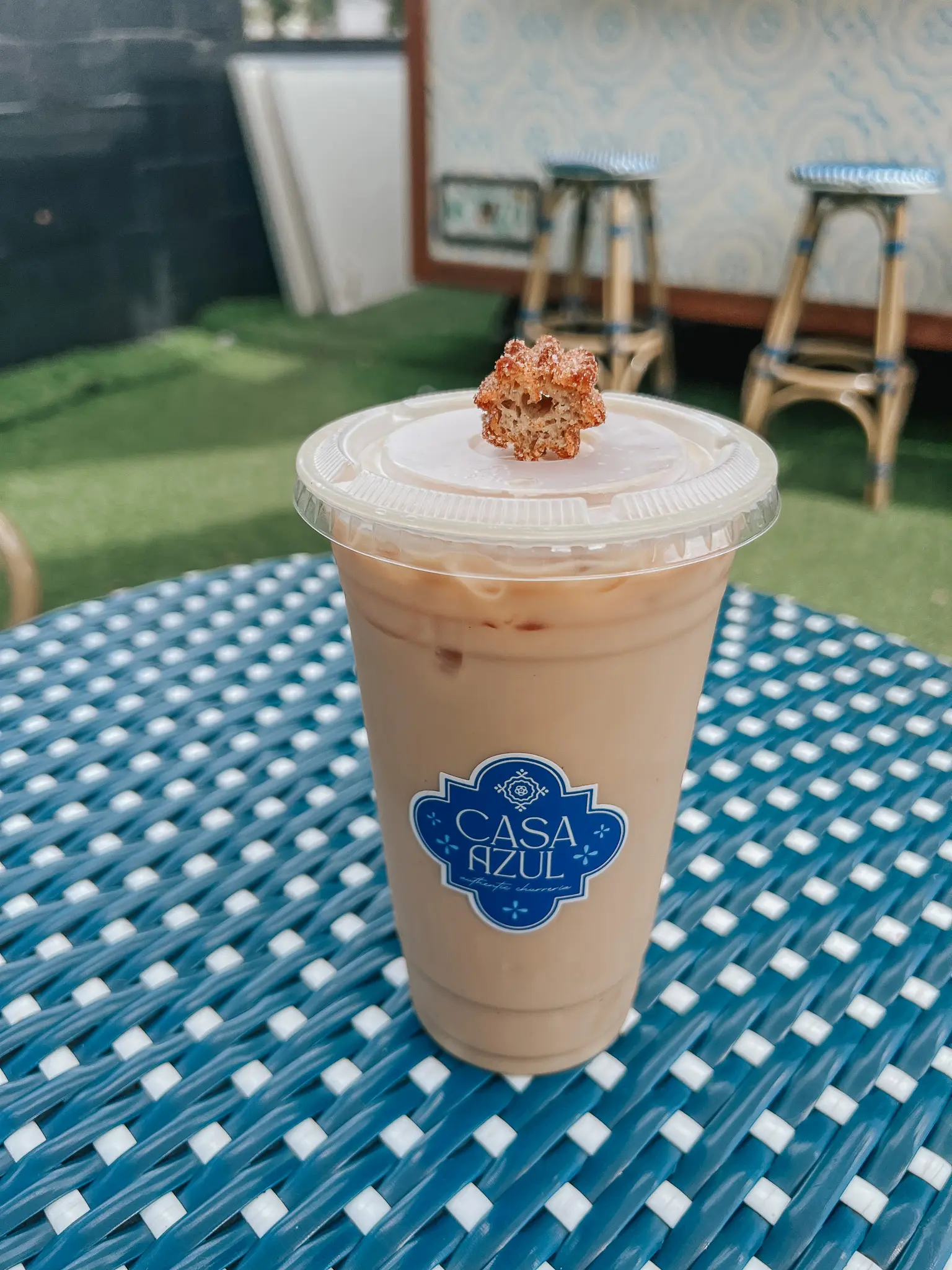Casa Azul South Tampa Coffee Shop 6 - Cats & Coffee Bourbon Vanilla Bean Latte from Casa Azul with a Churro bite