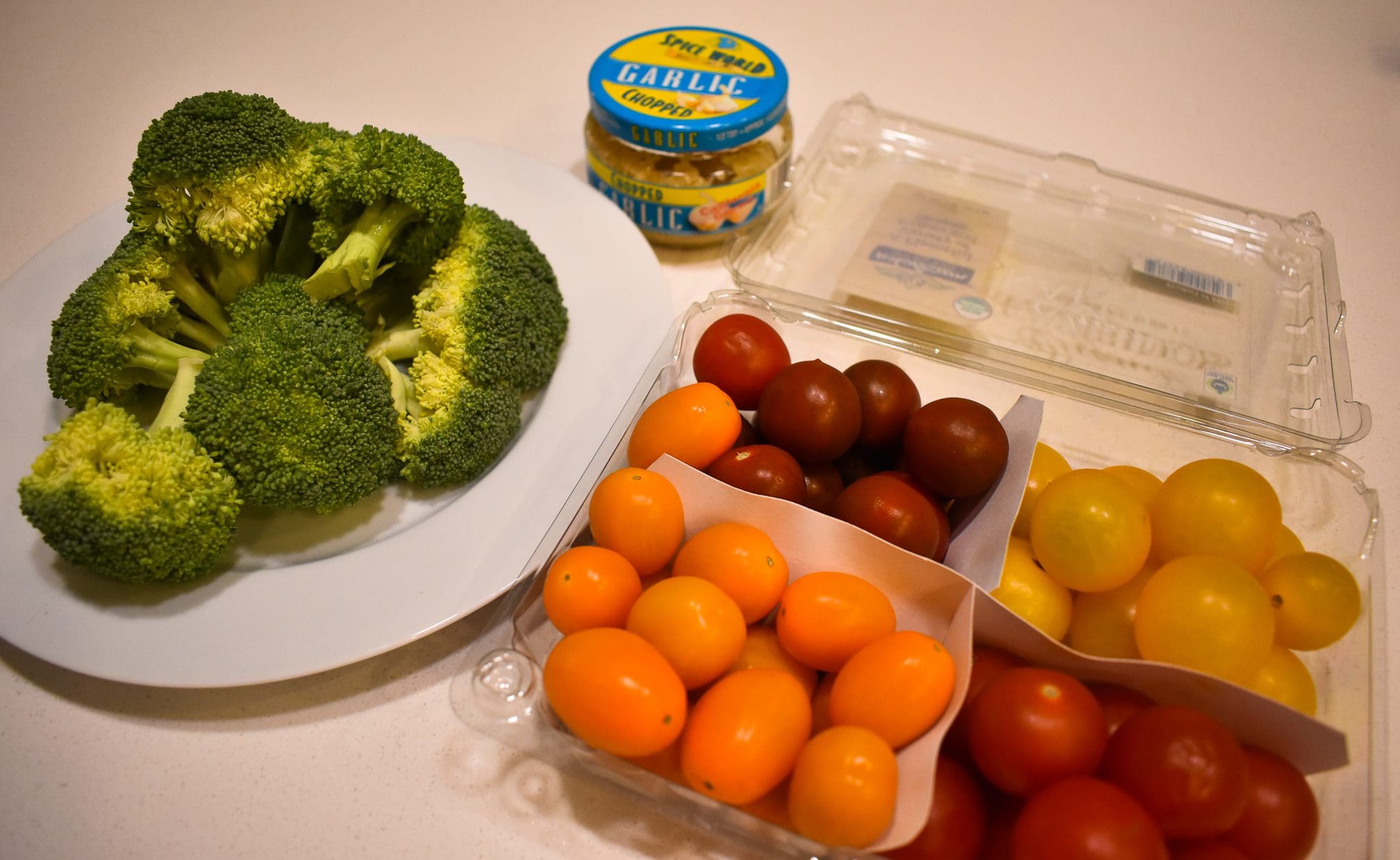 Cherry tomatoes, broccoli, and garlic