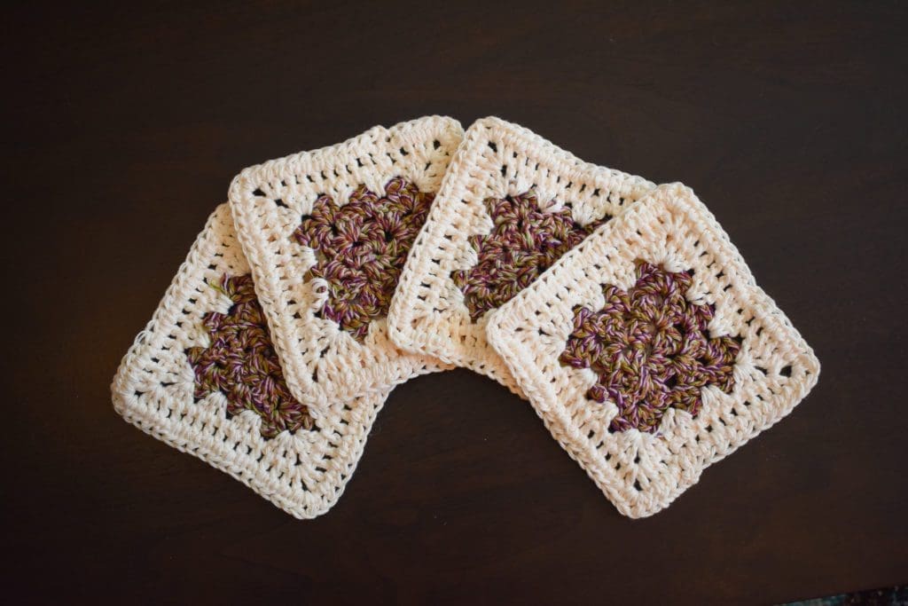 Rich Purple and Cream Four Piece Granny Square Crochet Coaster Set - Made With Colorful Cotton Yarn in Purple, Pink, Burnt Orange, and Green from Critter Crafting by Christine Csencsitz