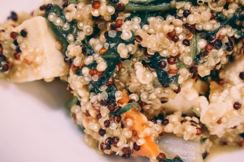 Quinoa and Tofu Vegetable Bowl -- Tofu is a versatile plant based protein and is a great option for meatless meals. Learn more about tofu and get my healthy tofu vegetable bowl recipe here!