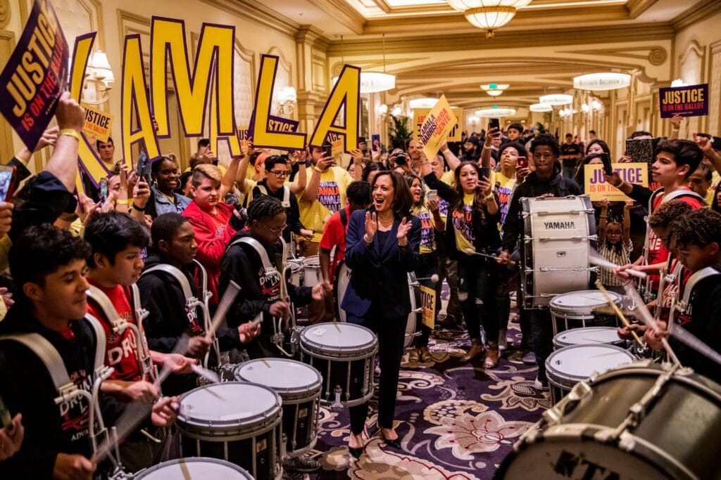 Joe Buglewicz for The New York Times - Ms. Harris cheered on her supporters before the Nevada State Democratic Party’s “First In The West” event in Las Vegas in 2019.