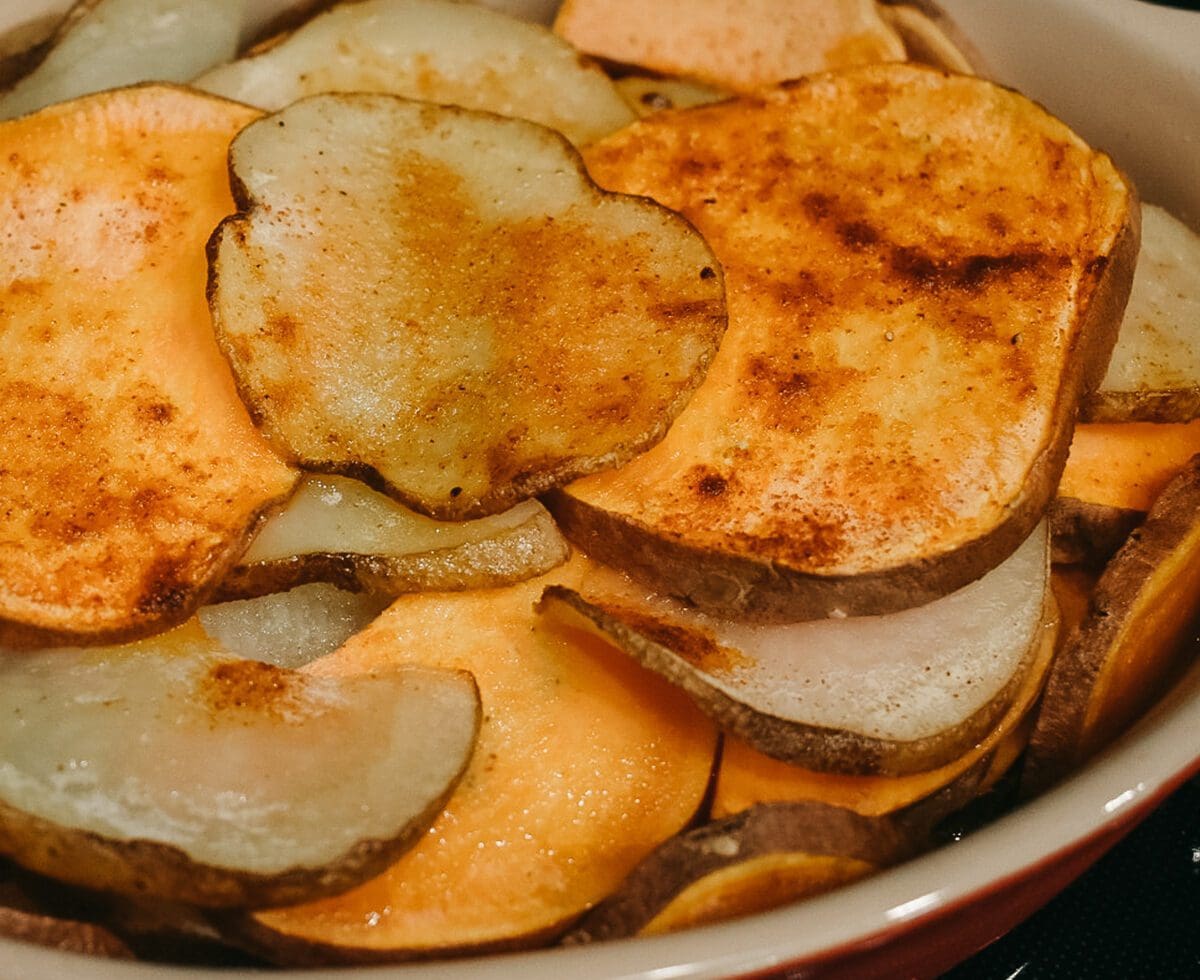 This simple sweet and russet roasted potatoes recipe is ideal as a seasonal side, a potluck dish, or meal prep. Get the vegan recipe here!