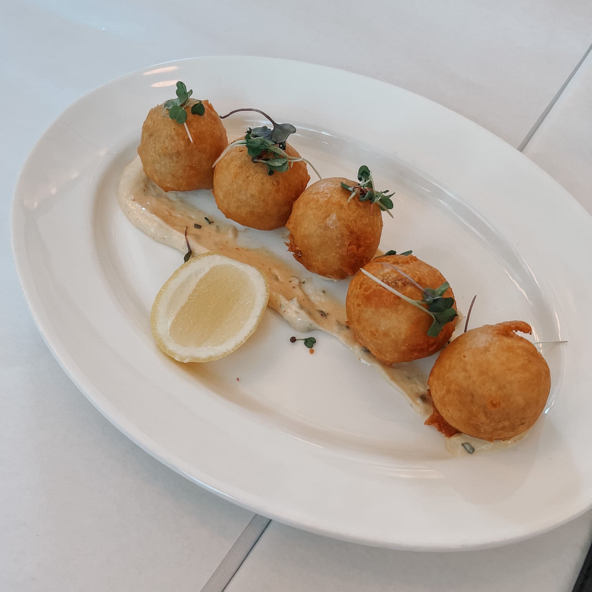 Blue Crab Beignets at Boulon Brasserie & Bakery in Tampa, Florida 